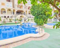 Zwembad met tuin | Koop appartement in Torrevieja - Costa Blanca