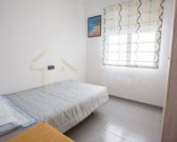 Apartamento en primera línea en Playa Flamenca con vistas al mar - dormitorio